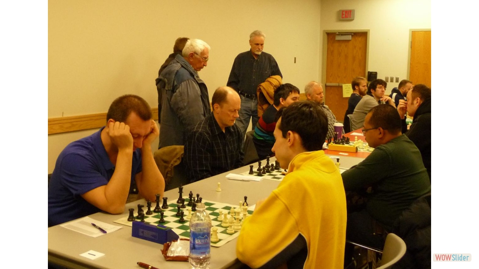 Marchand Open 2014. GM Mark Paragua vs Igor Nikolayev, in front GM Alex Lenderman vs GM Gata Kamsky. With this draw in the last round Igor tied for 3rd with GMs Lenderman, Ivanov, Paragua and NM Matt Parry.