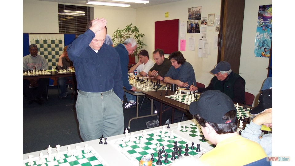 FM Igor Nikolayev and FM Isay Golyak playing a dual simultaneous in the Rochester Chess Center, 2006.
The result was +24=1.